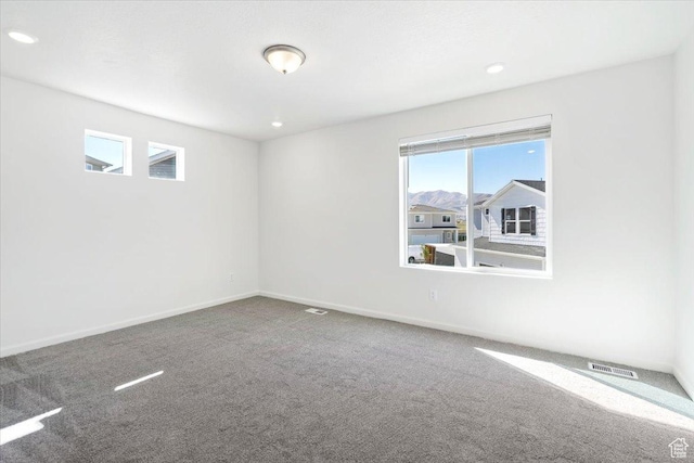 353 N Colonnade Rd Unit 1007, Saratoga Springs, UT 84045 - empty room with baseboards, recessed lighting, visible vents, and carpet