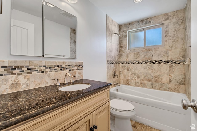 full bathroom with toilet,  shower combination, tasteful backsplash, and vanity