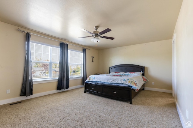 5140 S 3500 W, Roy, UT 84067 - carpeted bedroom with visible vents, baseboards, and a ceiling fan