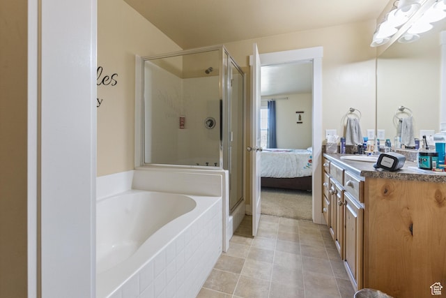 5140 S 3500 W, Roy, UT 84067 - bathroom featuring a garden tub, vanity, tile patterned flooring, and a stall shower