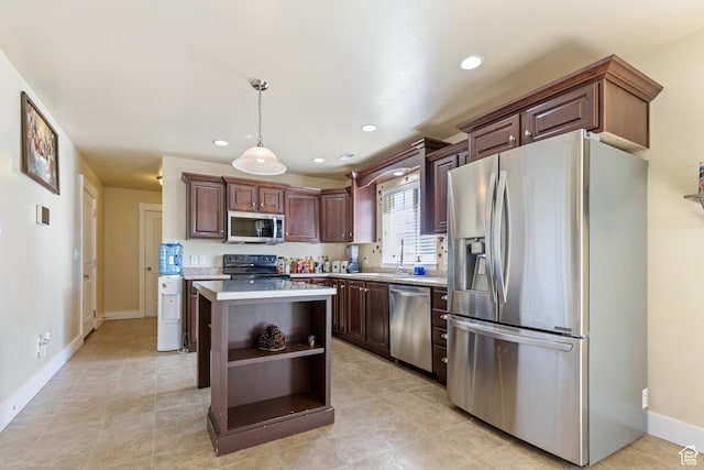 5140 S 3500 W, Roy, UT 84067 - kitchen with a center island, open shelves, stainless steel appliances, pendant lighting, and light countertops