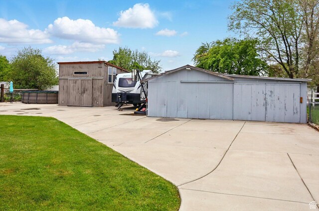569 N 700 E, Mapleton, UT 84664 - view of patio / terrace featuring a storage shed and an outbuilding