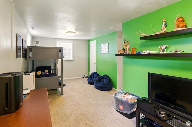 569 N 700 E, Mapleton, UT 84664 - rec room with a textured ceiling, baseboards, and carpet