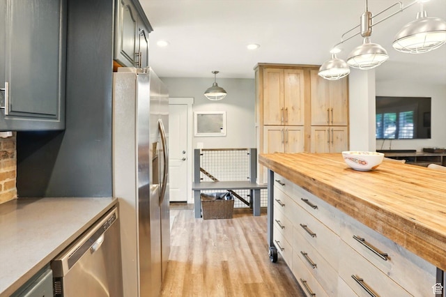 569 N 700 E, Mapleton, UT 84664 - kitchen featuring butcher block countertops, stainless steel appliances, decorative light fixtures, recessed lighting, and light wood-style floors