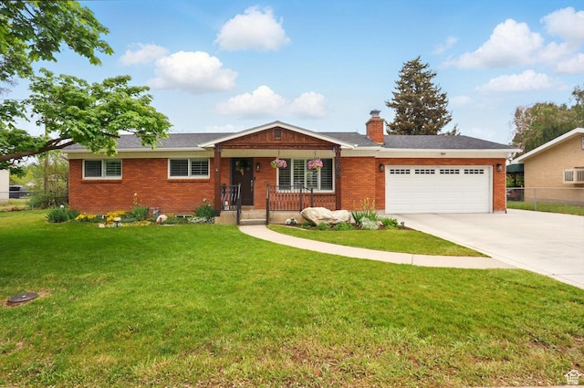 569 N 700 E, Mapleton, UT 84664 - single story home with a front lawn, driveway, brick siding, and an attached garage