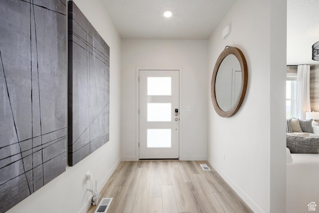 2522 N Wildwood Ln E Unit 240, Heber City, UT 84032 - foyer entrance featuring light wood-type flooring and baseboards
