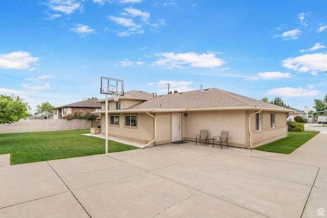235 W 1000 N, Bountiful, UT 84010 - rear view of property with a shingled roof, stucco siding, a lawn, and a patio