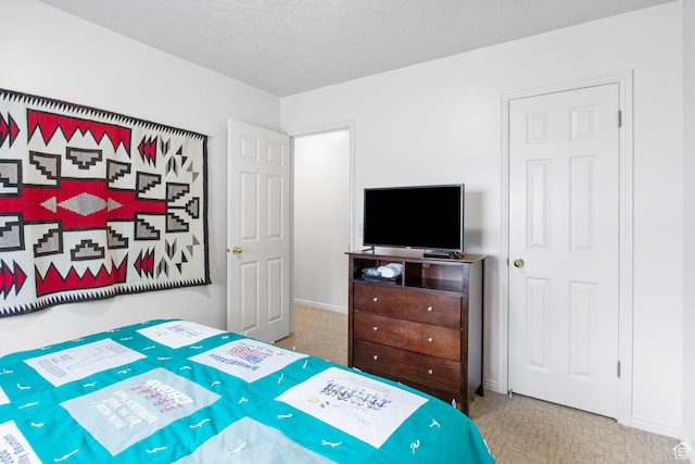 235 W 1000 N, Bountiful, UT 84010 - carpeted bedroom featuring a textured ceiling and baseboards