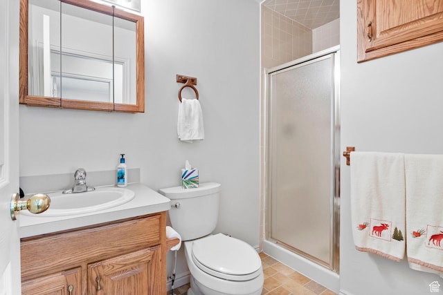 235 W 1000 N, Bountiful, UT 84010 - bathroom featuring a stall shower, vanity, and toilet