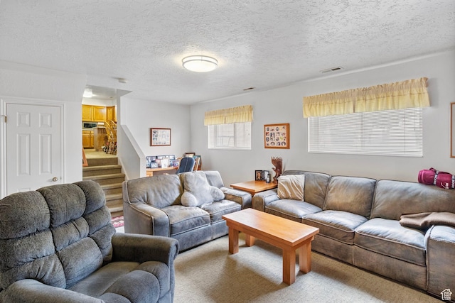 235 W 1000 N, Bountiful, UT 84010 - carpeted living area with stairs, visible vents, and a textured ceiling