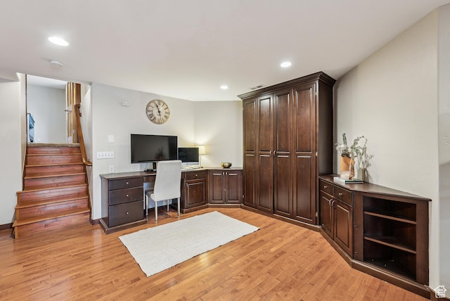 home office featuring light wood finished floors and recessed lighting