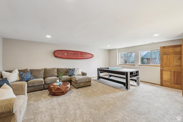 living room featuring carpet, baseboards, and recessed lighting