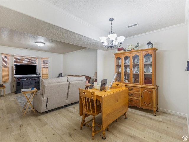 890 E Hamlet Cir N, Midway, UT 84049 - dining space with a notable chandelier, crown molding, light wood-style flooring, and visible vents