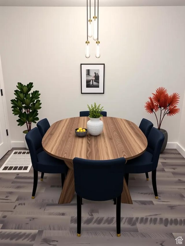 621 Shay Ln, Tooele, UT 84074 - dining room with baseboards and wood finished floors