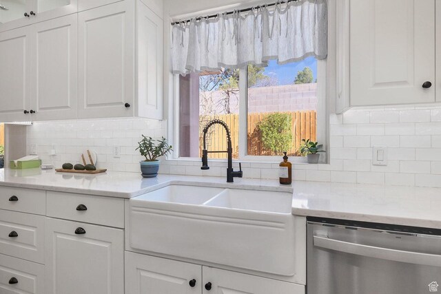 1056 W 100 N, St George, UT 84770 - kitchen featuring backsplash, white cabinetry, stainless steel dishwasher, and a sink