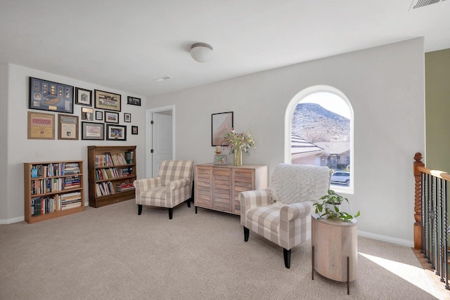 1056 W 100 N, St George, UT 84770 - living area featuring light carpet, baseboards, and a mountain view