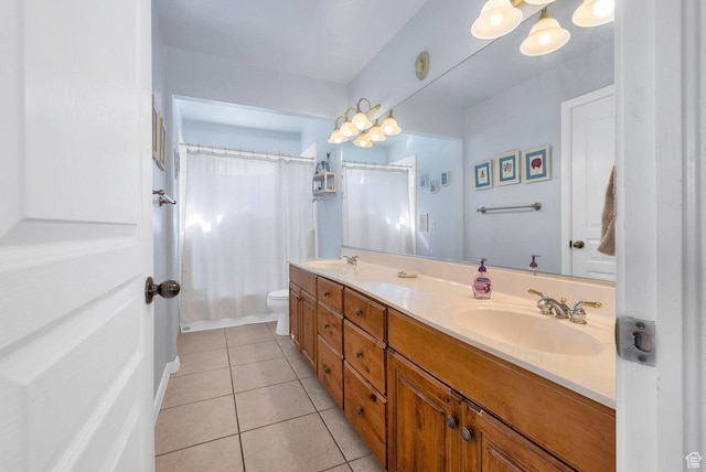 1056 W 100 N, St George, UT 84770 - bathroom featuring toilet, a sink, curtained shower, tile patterned flooring, and double vanity