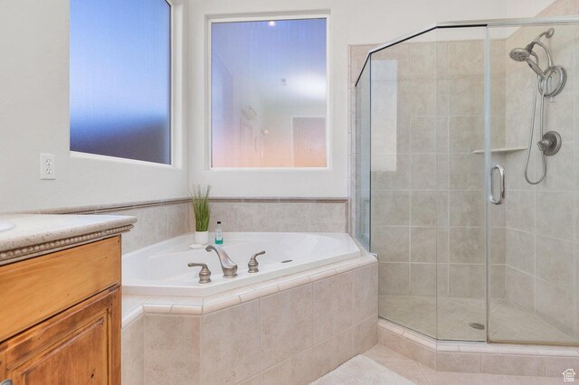 1056 W 100 N, St George, UT 84770 - bathroom featuring a garden tub, vanity, and a stall shower