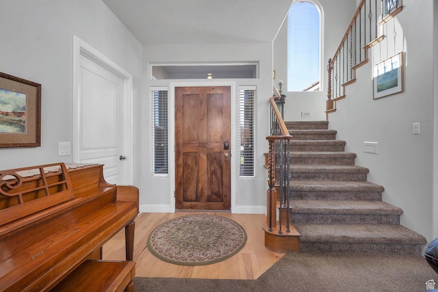 1056 W 100 N, St George, UT 84770 - foyer entrance with baseboards, stairs, and wood finished floors