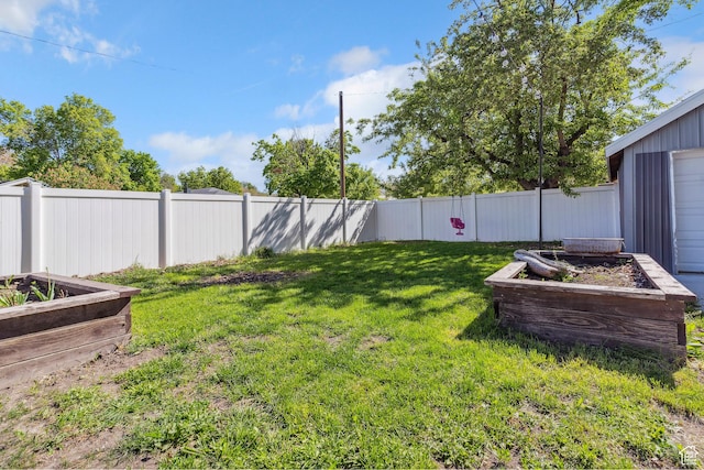 1923 S 600 E, Salt Lake City, UT 84105 - view of yard with a vegetable garden and a fenced backyard