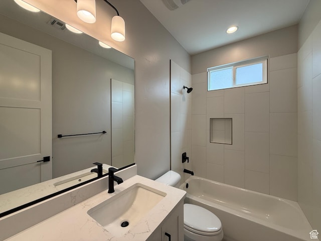 full bath with shower / bathing tub combination, vanity, toilet, and visible vents