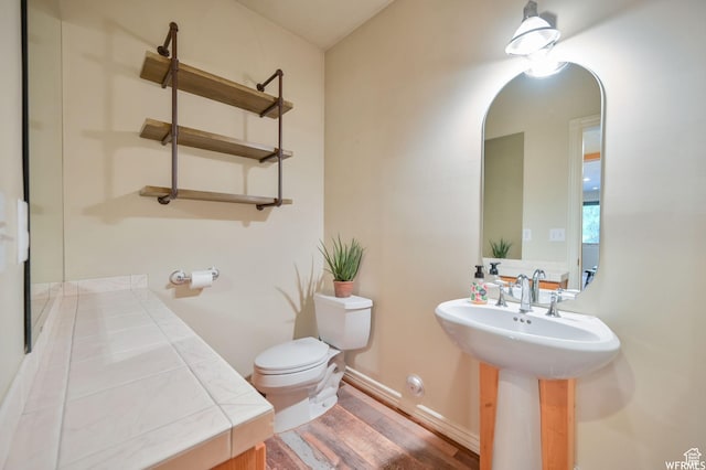 320 S Old Farm Ln E, Coalville, UT 84017 - half bath featuring a sink, toilet, and wood finished floors