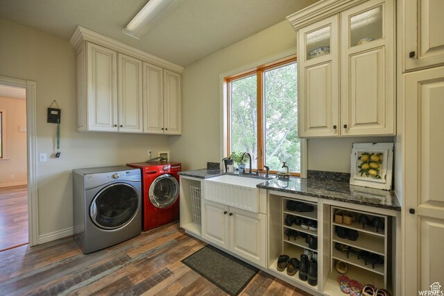 320 S Old Farm Ln E, Coalville, UT 84017 - clothes washing area with baseboards, a sink, cabinet space, washing machine and clothes dryer, and dark wood-style floors