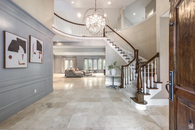 680 S Davis Blvd, Bountiful, UT 84010 - foyer featuring stairway, baseboards, a towering ceiling, and recessed lighting