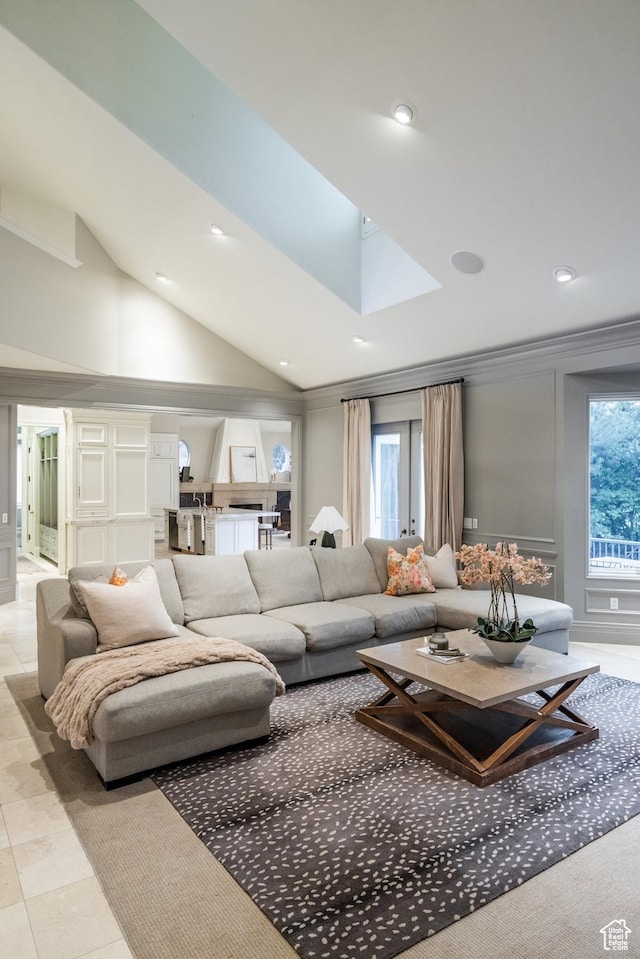 680 S Davis Blvd, Bountiful, UT 84010 - living room featuring lofted ceiling with skylight and recessed lighting