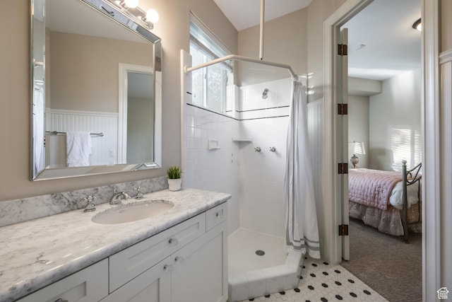 680 S Davis Blvd, Bountiful, UT 84010 - ensuite bathroom featuring a stall shower, vanity, and ensuite bath