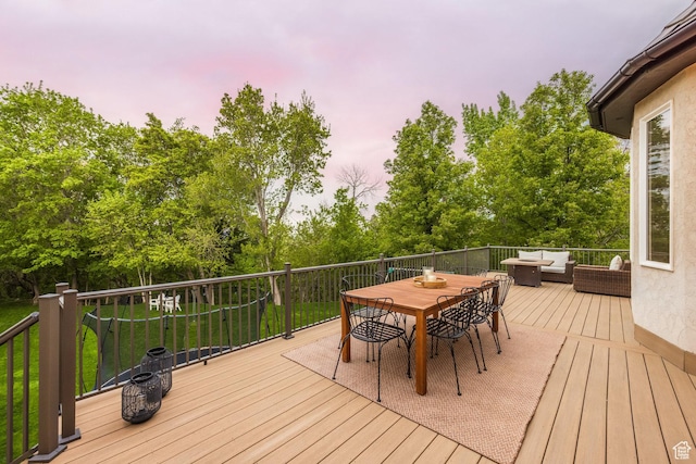 680 S Davis Blvd, Bountiful, UT 84010 - deck at dusk featuring outdoor dining area and outdoor lounge area