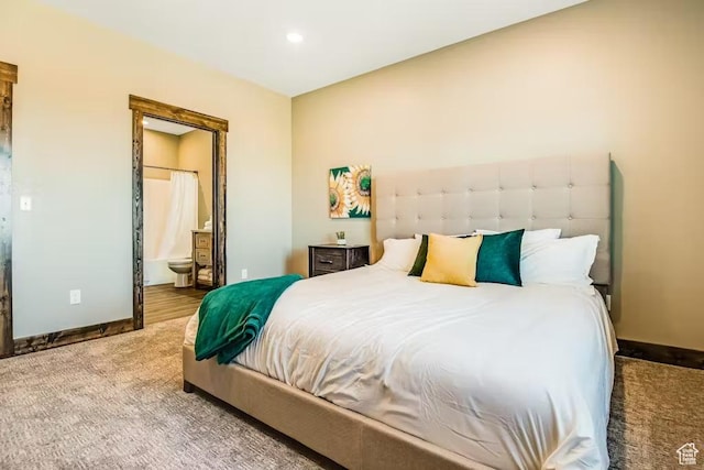 2869 S Chukar Dr Unit 63, Garden City, UT 84028 - bedroom with carpet flooring, connected bathroom, baseboards, and recessed lighting