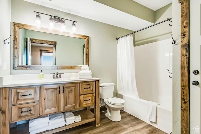 2869 S Chukar Dr Unit 63, Garden City, UT 84028 - full bath with toilet, shower / tub combo, wood finished floors, and vanity