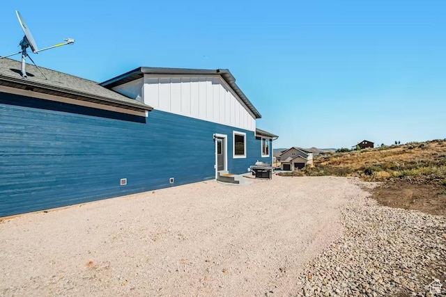 2869 S Chukar Dr Unit 63, Garden City, UT 84028 - back of property with board and batten siding