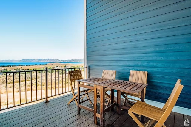 2869 S Chukar Dr Unit 63, Garden City, UT 84028 - balcony with a water and mountain view and outdoor dining area