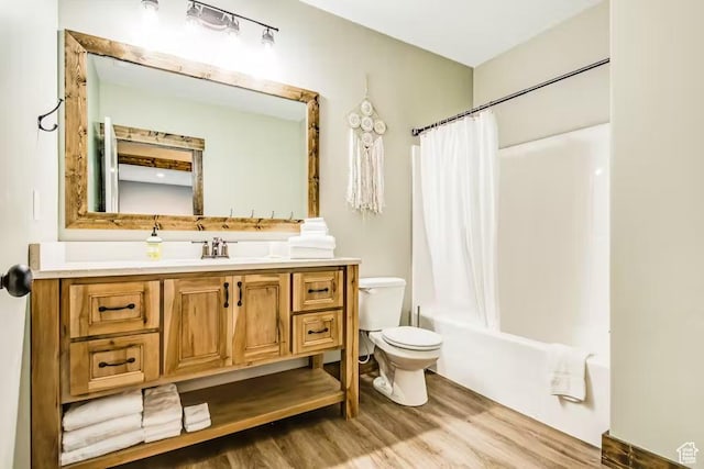 2869 S Chukar Dr Unit 63, Garden City, UT 84028 - bathroom with toilet, shower / bath combo, wood finished floors, and vanity