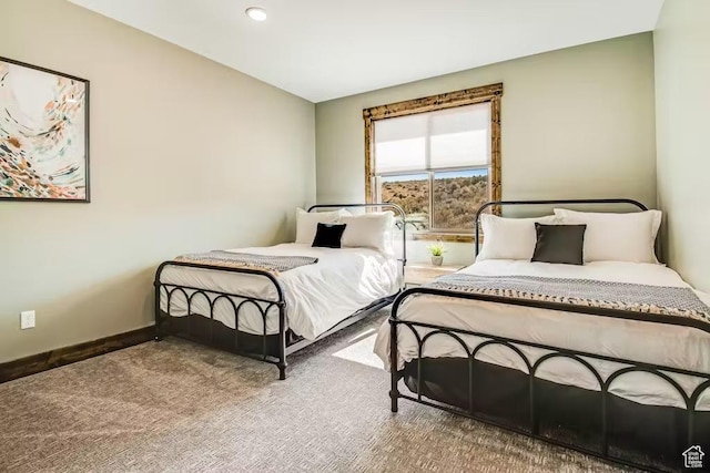 2869 S Chukar Dr Unit 63, Garden City, UT 84028 - carpeted bedroom with baseboards