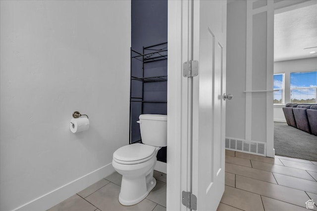 8072 N Rock Creek Cove Ln, Eagle Mountain, UT 84005 - bathroom featuring baseboards, tile patterned floors, and visible vents