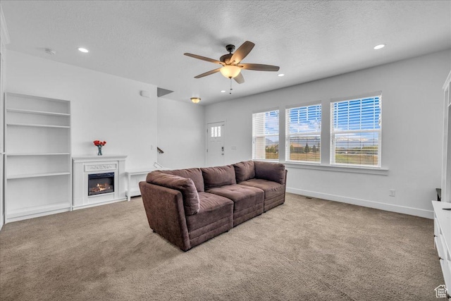 8072 N Rock Creek Cove Ln, Eagle Mountain, UT 84005 - carpeted living area with recessed lighting, ceiling fan, and a textured ceiling