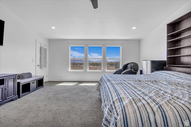 8072 N Rock Creek Cove Ln, Eagle Mountain, UT 84005 - carpeted bedroom featuring a ceiling fan, baseboards, recessed lighting, and a textured ceiling