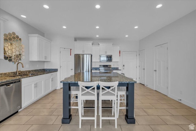 8072 N Rock Creek Cove Ln, Eagle Mountain, UT 84005 - kitchen with recessed lighting, white cabinetry, stainless steel appliances, and a sink