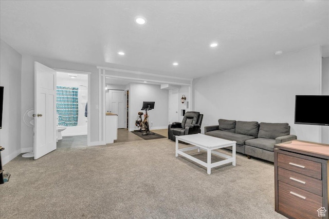 8072 N Rock Creek Cove Ln, Eagle Mountain, UT 84005 - living area featuring baseboards, light carpet, and recessed lighting