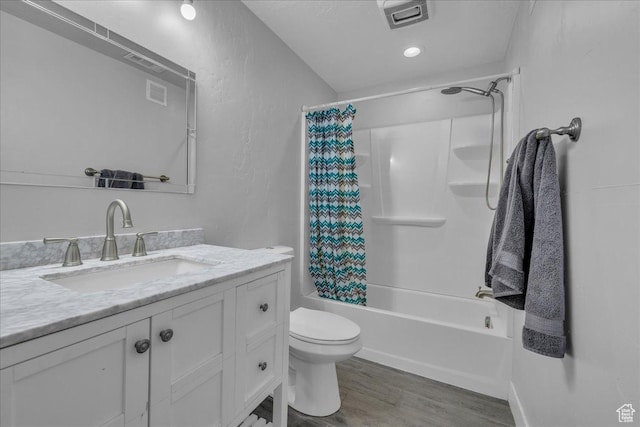 8072 N Rock Creek Cove Ln, Eagle Mountain, UT 84005 - bathroom with toilet, wood finished floors, vanity, visible vents, and shower / bathtub combination with curtain