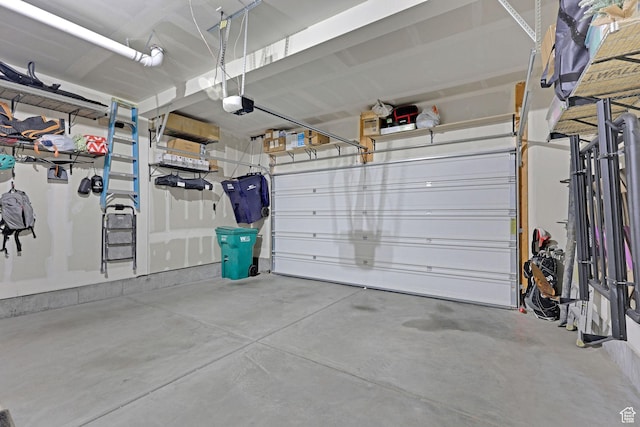 garage featuring a garage door opener