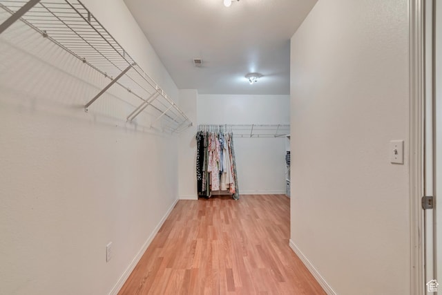 13623 S Blayde Dr W, Herriman, UT 84096 - walk in closet featuring light wood-style floors