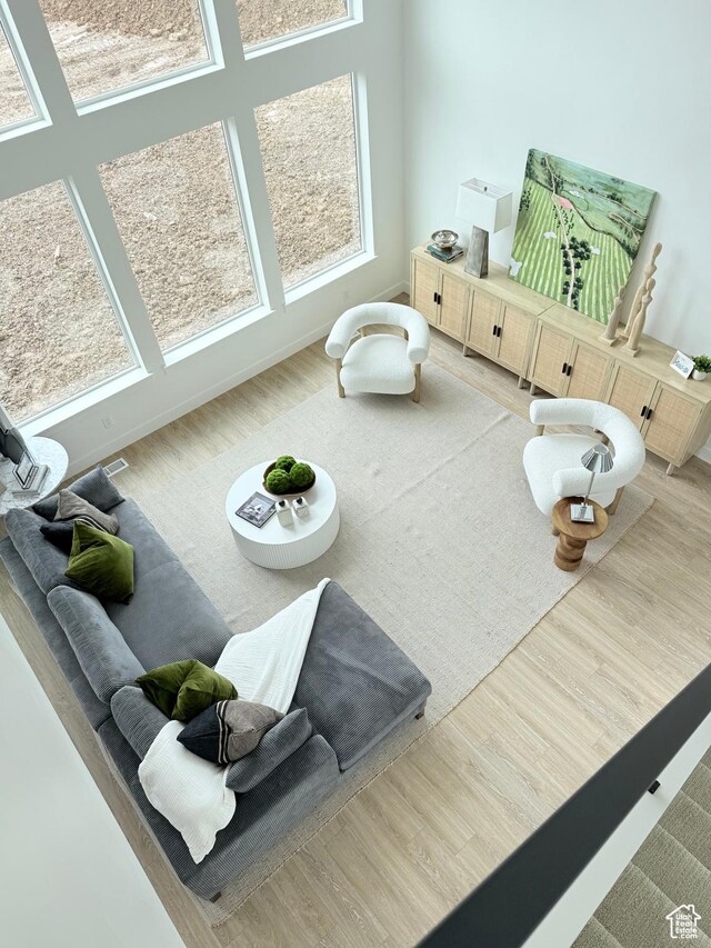 exercise room with wood finished floors
