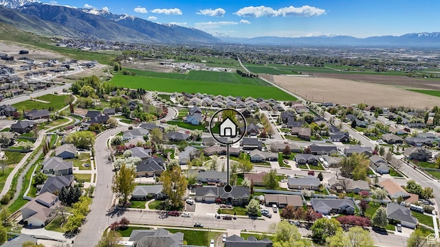 aerial view with a mountain view and a residential view