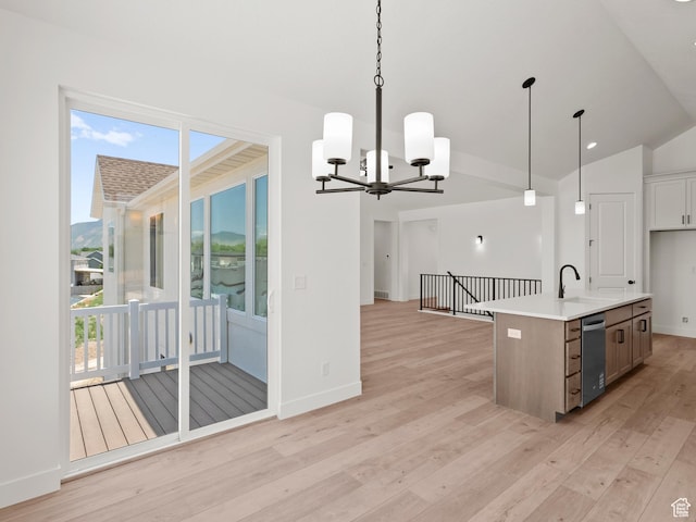 1336 W 800 S Unit 22, Spanish Fork, UT 84660 - kitchen featuring dishwasher, light wood-type flooring, a chandelier, hanging light fixtures, and light countertops