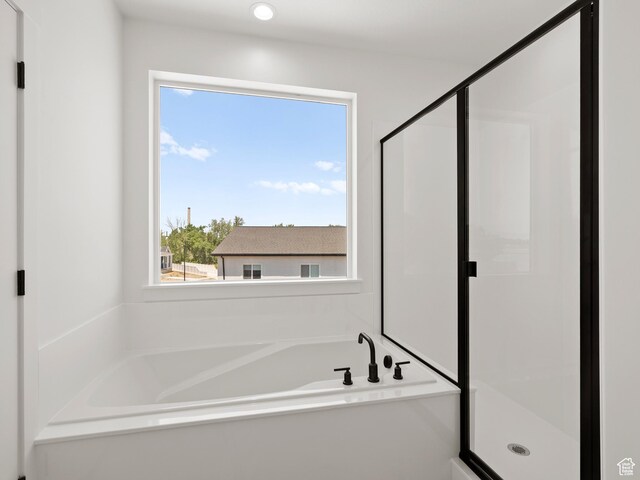 1336 W 800 S Unit 22, Spanish Fork, UT 84660 - full bathroom featuring a stall shower, a garden tub, and healthy amount of natural light