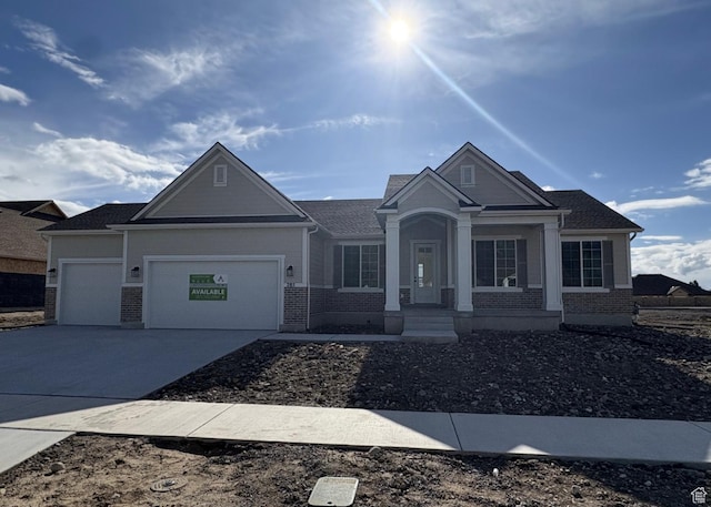 285 N 990 E Unit 13, Salem, UT 84653 - craftsman-style home with brick siding, a garage, and concrete driveway
